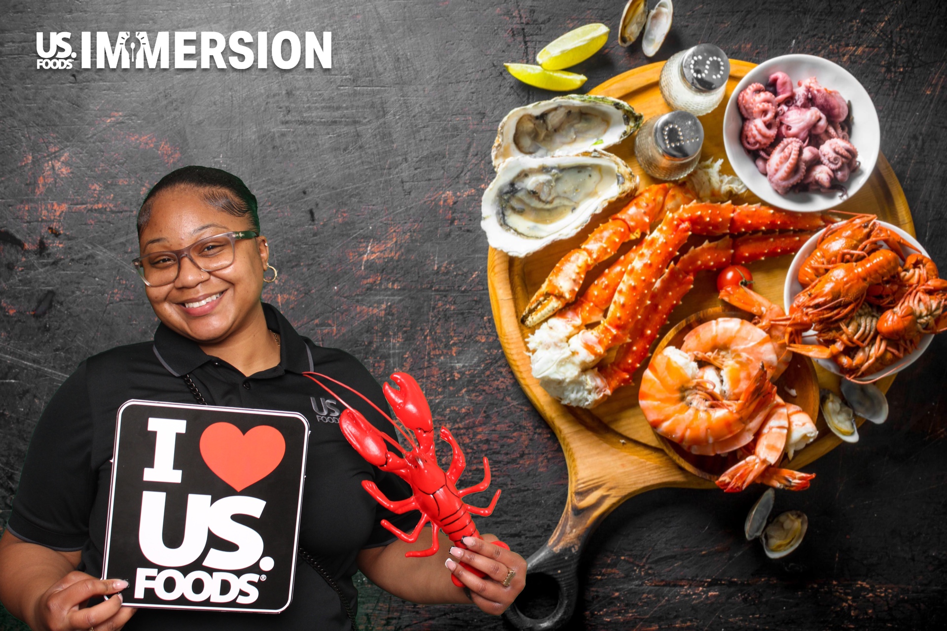US Foods team member posing beside a seafood platter green screen backdrop