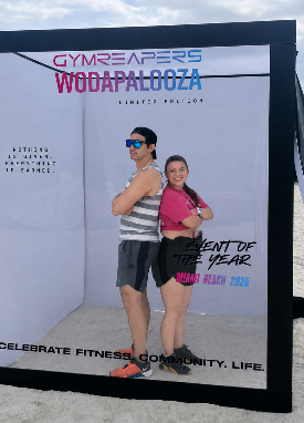 Guests posing inside the branded Wodapalooza cover studio by SnapJoy