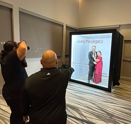 Couple photographed for a Living the Legacy honoree cover at a gala