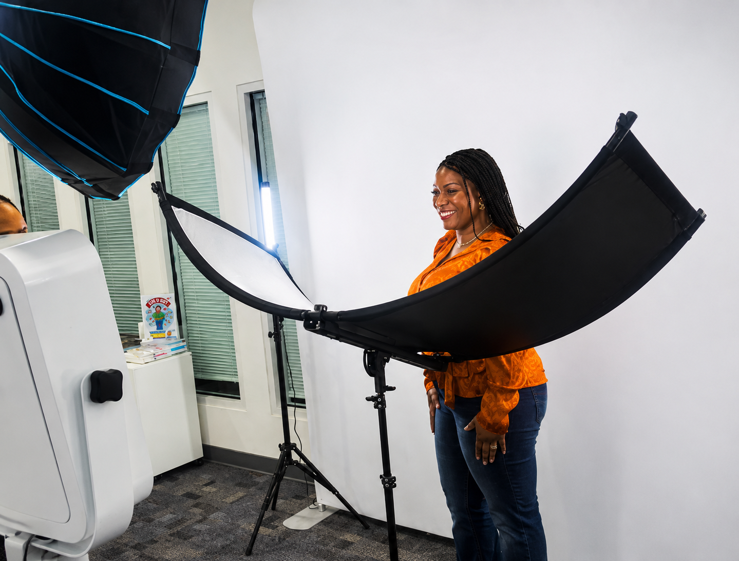 Corporate attendee receiving a professional headshot at a SnapJoy event studio