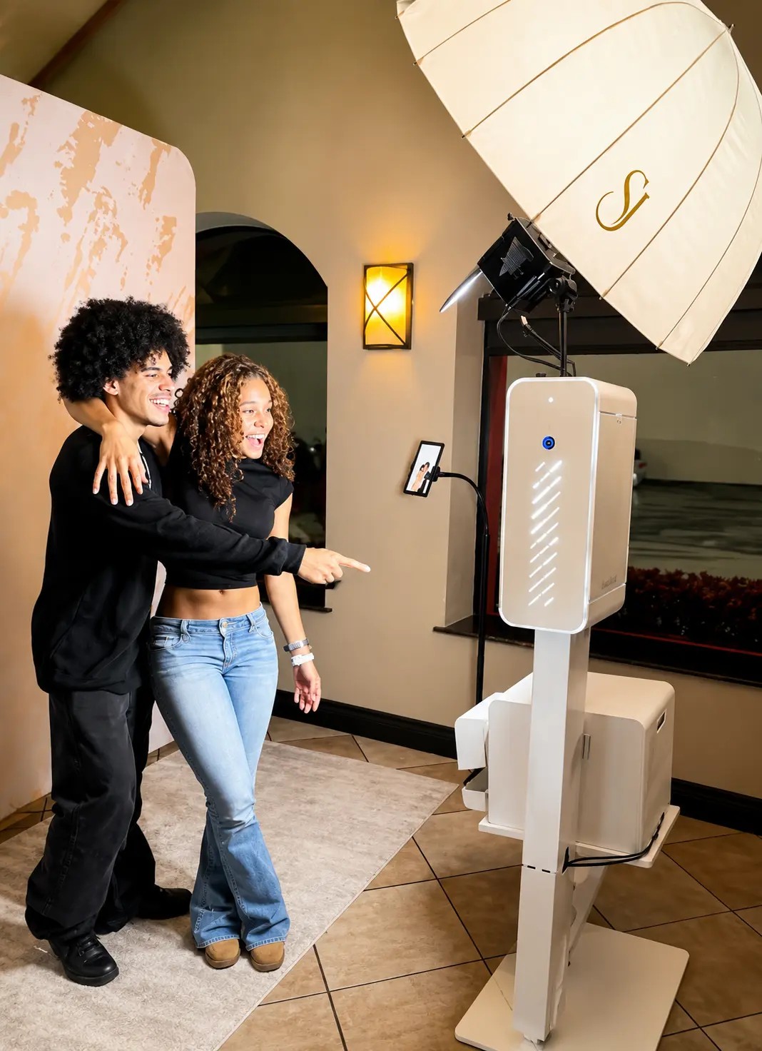 Guest pointing at the pose she wants to try before stepping in