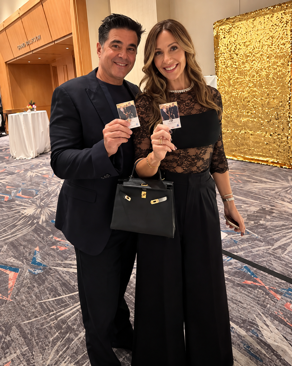 Corporate event guests holding personalized branded trading card keepsakes