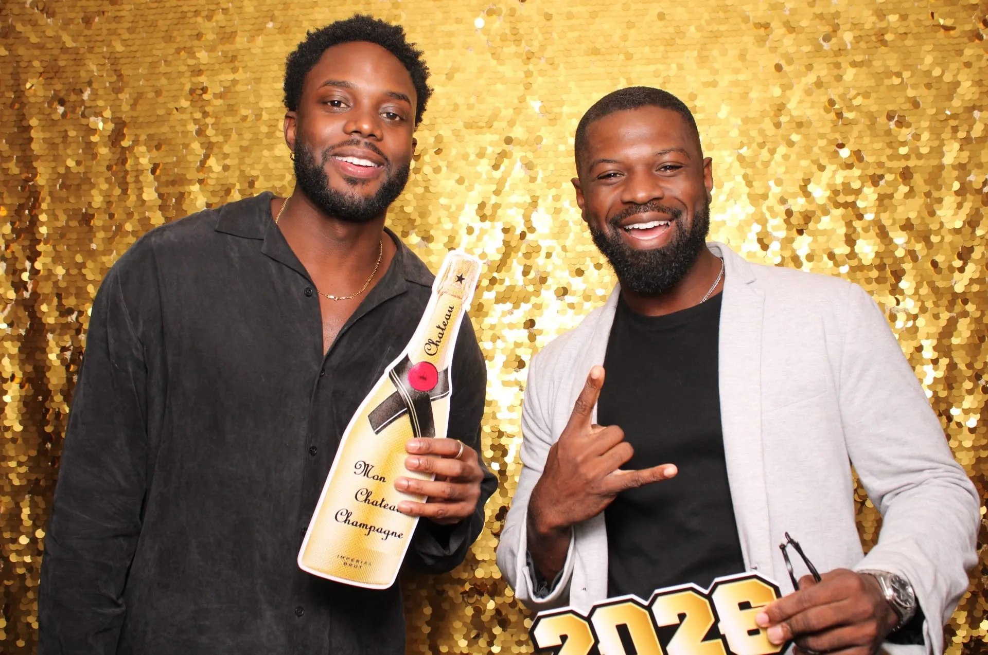 Friends celebrating with champagne prop