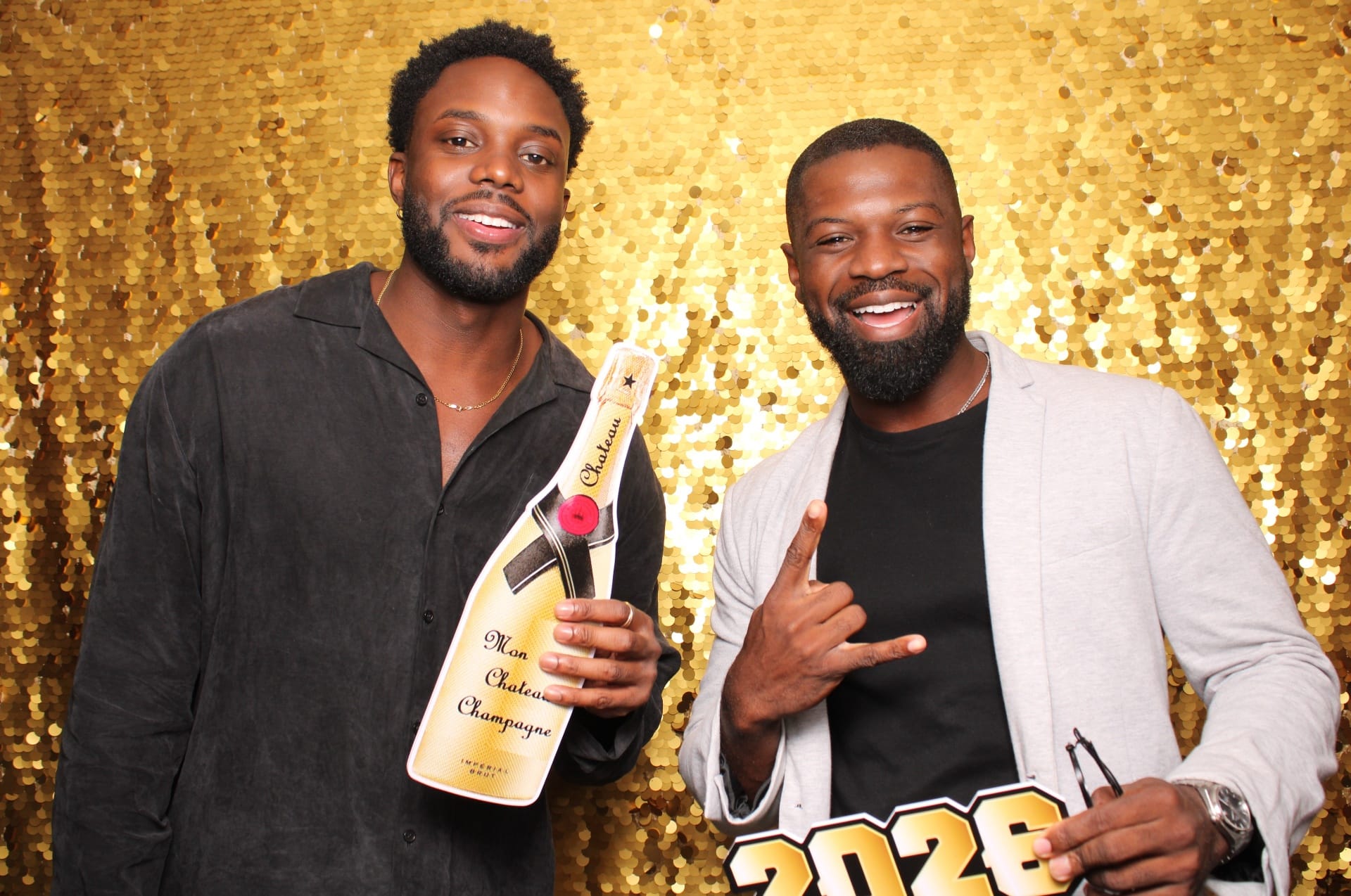 Friends celebrating with champagne prop