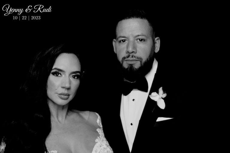 Black and white editorial portrait of bride and groom